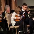Н.В. и М.В. Гайворонские с учениками в оркестре